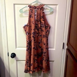 Summer floral dress, coral color with blue flowers.